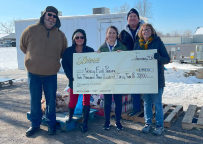 Belterra Volunteers with Donation Check